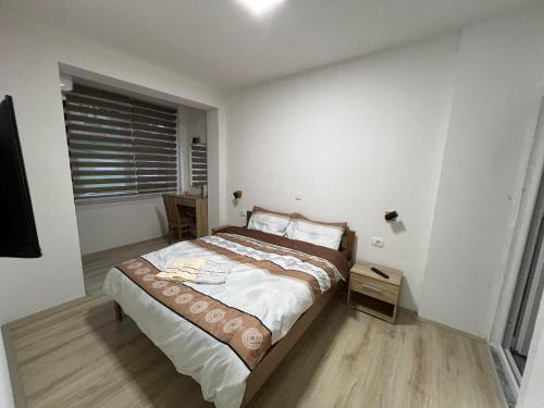 Ένα ή περισσότερα κρεβάτια σε δωμάτιο στο Royal Stars Apartments