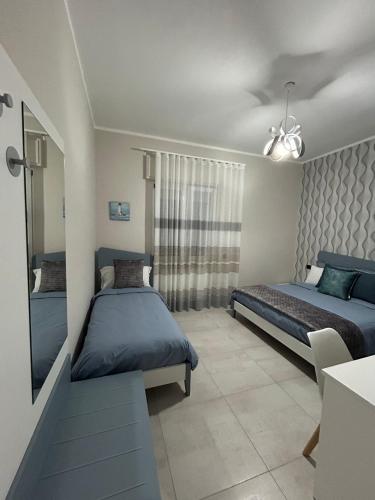 Katil atau katil-katil dalam bilik di B&B Girasoli