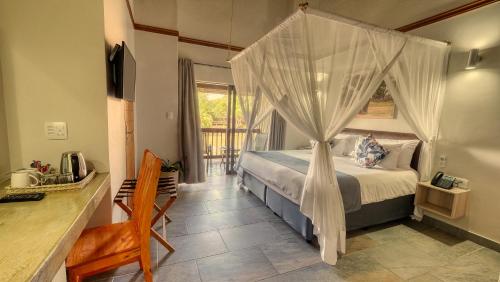 Katil atau katil-katil dalam bilik di Umbhaba Eco Lodge