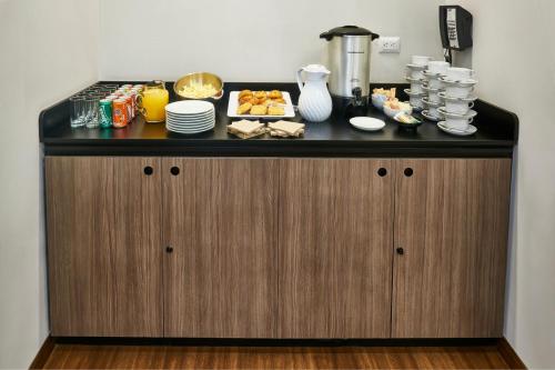 a counter top with food on top of it at City Express Suites by Marriott Tijuana Rio in Tijuana