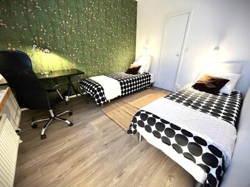 Voodi või voodid majutusasutuse Charming house in Kuusamo toas