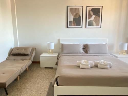 Ліжко або ліжка в номері Casa Relax con Parcheggio e Metro