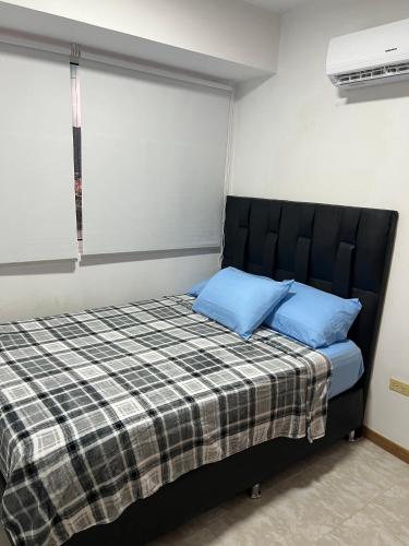 Ένα ή περισσότερα κρεβάτια σε δωμάτιο στο Apartamento Diagonal a Hesperia y Dunas