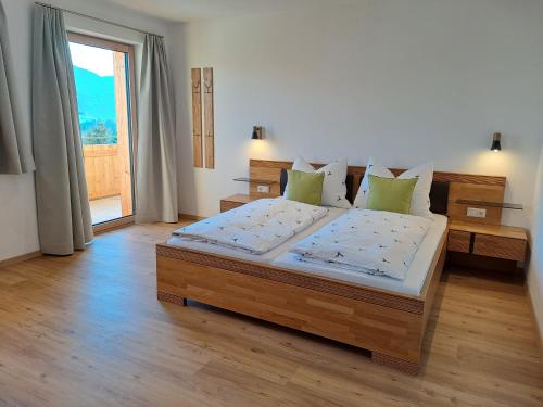 Postel nebo postele na pokoji v ubytování Sonnseit Appartement