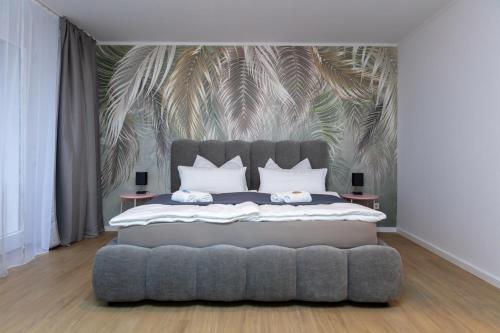 En eller flere senge i et værelse på CABANA City-Center - Küche - Netflix - Parkplatz