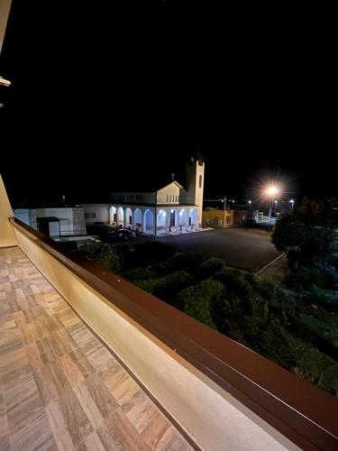 a view of a building at night at B&B borgo Dolcecanto in Gravina in Puglia