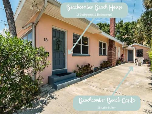 a home with a pink house with a blue door at Beachcomber Beach House - Weekly Rental Just Steps to White Sand Beach! home in Clearwater Beach