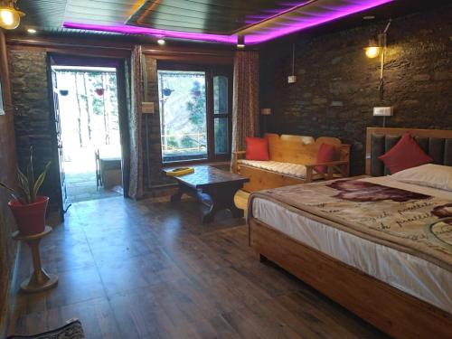 Postel nebo postele na pokoji v ubytování Nature Villaas BASA HOMESTAY