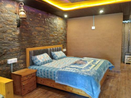 Postel nebo postele na pokoji v ubytování Nature Villaas BASA HOMESTAY