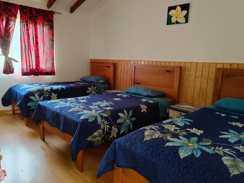 Postel nebo postele na pokoji v ubytování Hostal Kaiheke