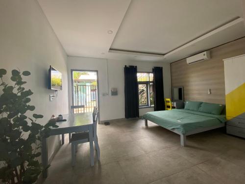 Кровать или кровати в номере CHILL HOUSE by the beach
