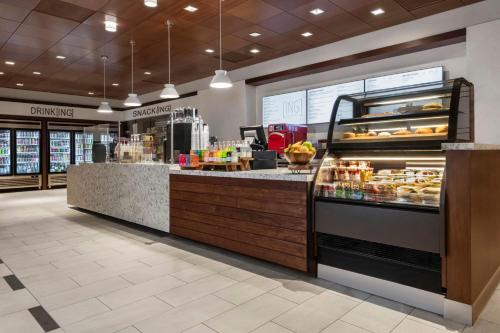 a bakery with a counter with pastries on it at The Westin San Diego Gaslamp Quarter in San Diego