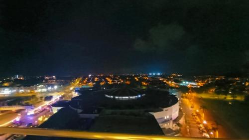 a view of a city at night with lights at Kulai d'putra suites beside ioiMall near Airport and JPO in Kulai