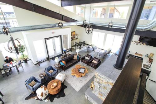 an overhead view of a living room with couches at Mountain View Chalet at The Quarry - Sleeps 6! in Whitefish