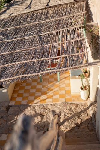 an overhead view of a cage on top of a house at Dar Afoulky Maison D'hotes in Sidi Kaouki