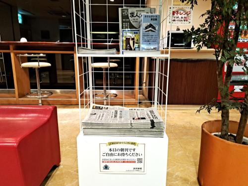 a stack of books on a table in a store at Tetora Higashimuroran in Muroran