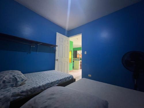 Letto o letti in una camera di Las Casitas de Playa Ne gra