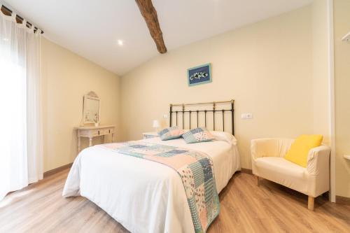Postel nebo postele na pokoji v ubytování Casa rural MAZA especial grupos