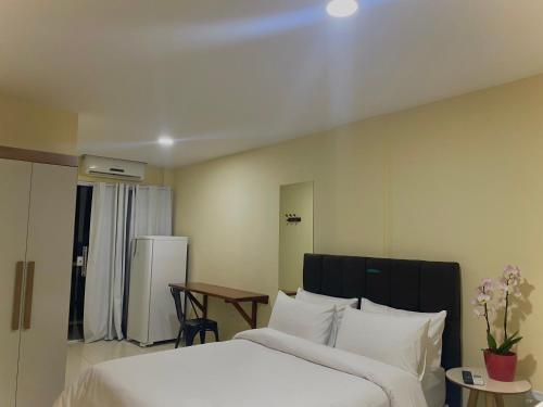 Ein Bett oder Betten in einem Zimmer der Unterkunft Pousada Himura