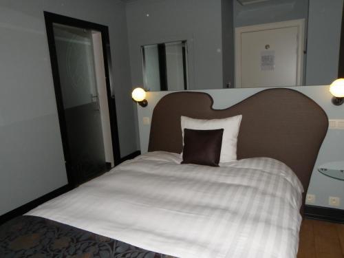 Una cama o camas en una habitación de Hotel B - Boskapelhoeve