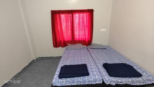 Cama o camas de una habitación en Aadishkti bhakt nivas