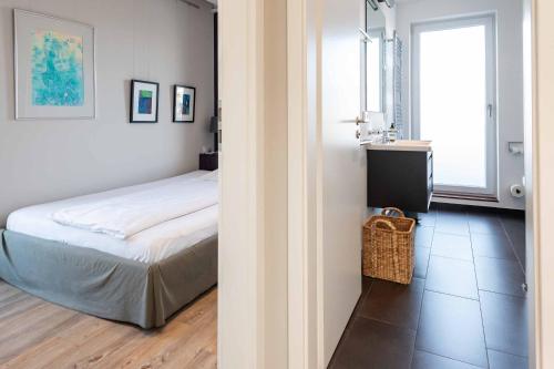 Ένα ή περισσότερα κρεβάτια σε δωμάτιο στο High End Penthouse