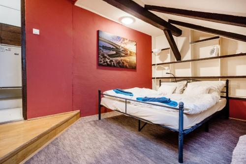 Katil atau katil-katil dalam bilik di Gul Baba Saray Apartments