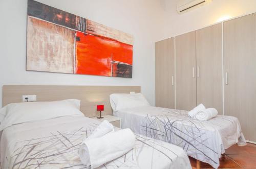 A bed or beds in a room at Aubadallet