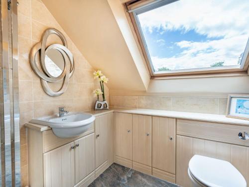 a bathroom with a sink and a window at 1 bed in Lauder 57931 in Lauder