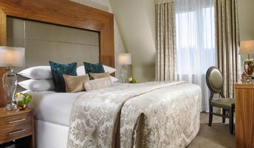 En eller flere senge i et værelse på Carrigaline Court Hotel & Leisure Centre