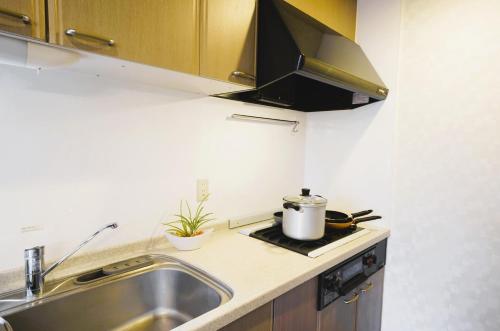 Dapur atau dapur kecil di Shinjuku Sakaue House