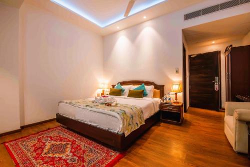 a bedroom with a large bed with a red rug at The Fern Surya Resort Kasauli Hills, Dharampur in Kasauli