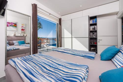 Postel nebo postele na pokoji v ubytování Holiday home Hojka 2