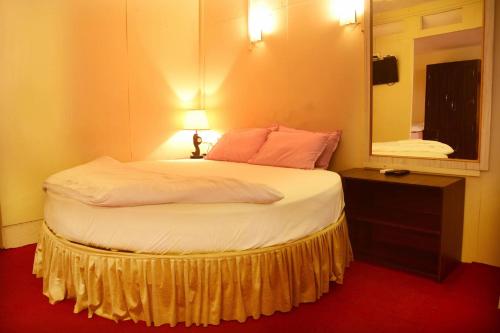 Кровать или кровати в номере Hotel My Soulmate, Palolem Beach