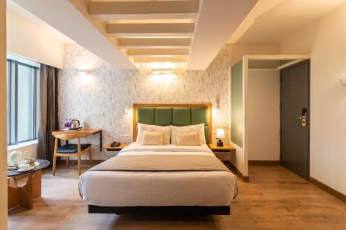 Postel nebo postele na pokoji v ubytování HOTEL LE ROYCE