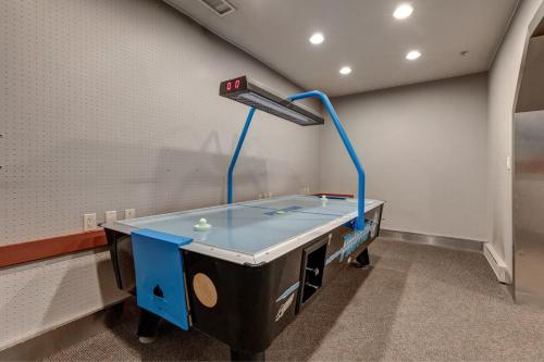 a ping pong table in a room at Powderhorn Lodge 102: Sego Lily Suite in Solitude