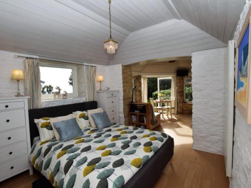 a bedroom with a large bed in a room at 1 Bed in Isle of Purbeck IC131 in Worth Matravers