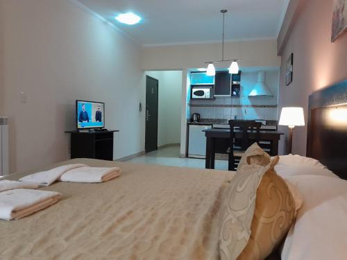 Ένα ή περισσότερα κρεβάτια σε δωμάτιο στο Antares Apartments