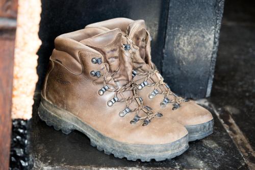 a pair of brown boots sitting on a step at The King's Head in Thirlmere