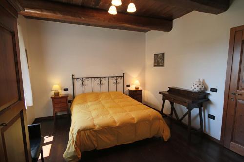 Ένα ή περισσότερα κρεβάτια σε δωμάτιο στο Agriturismo Valdifiori