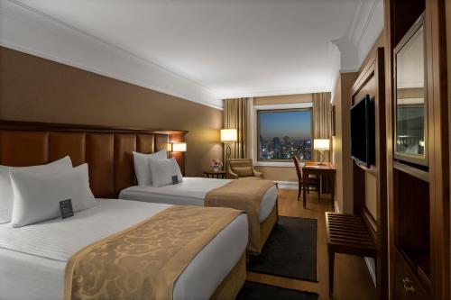 Tempat tidur dalam kamar di Rotta Hotel Istanbul