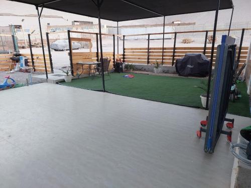 a batting cage with a batting cage at Casa Rural Poblado de Acha Arica in Arica