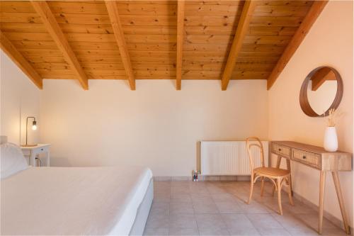Postel nebo postele na pokoji v ubytování Helianthus Apartments