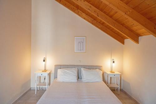 Ένα ή περισσότερα κρεβάτια σε δωμάτιο στο Helianthus Apartments