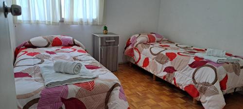 Кровать или кровати в номере Aconcagua VI