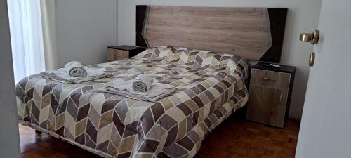 Llit o llits en una habitació de Aconcagua VI