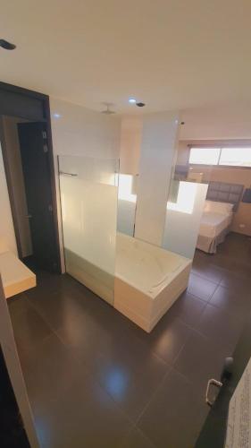 Un ou plusieurs lits dans un hébergement de l'établissement Hotel Cartagena DC