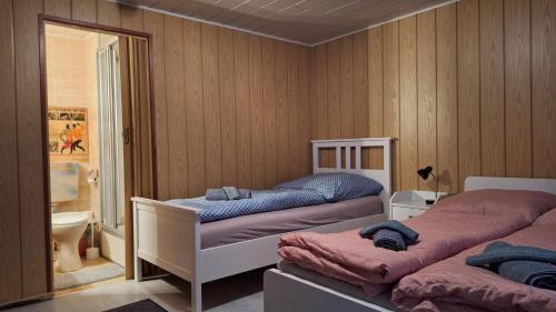 Säng eller sängar i ett rum på Apollo Pension und Saalvermietung
