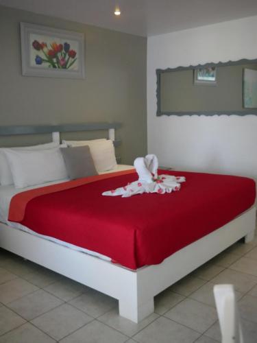 Costarena Beach Hotelにあるベッド