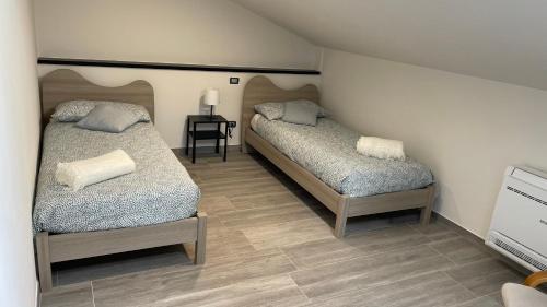 Кровать или кровати в номере Emma Apartment 135 mq